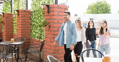 customers walking onto restaurant patio