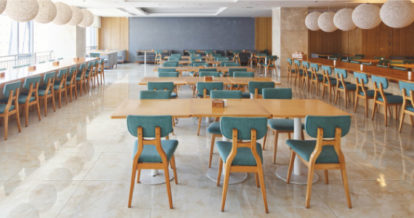 Large open food hall with tabletop and counter seating