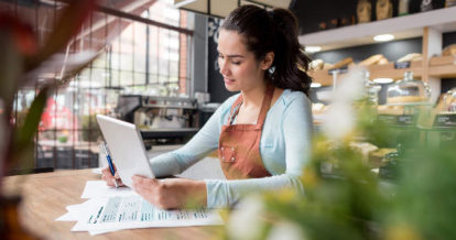 restaurant owner going through a checklist before soft launch