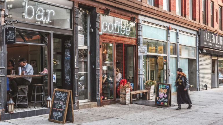Coffee shop storefront on a street in New York city