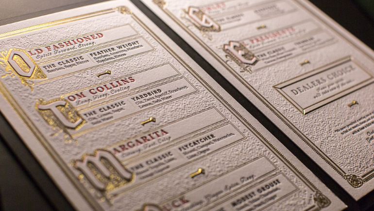 A menu with old english lettering