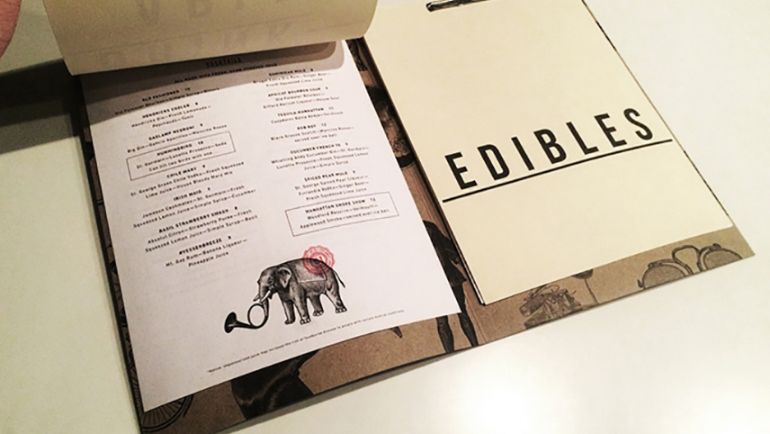 A menu with an illustration of an elephant