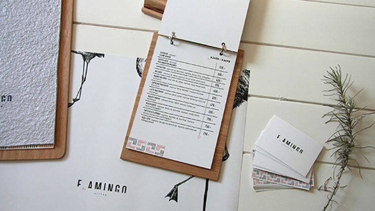 A menu on a wooden clipboard