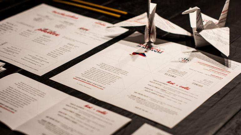 A menu that can be folder into a paper crane