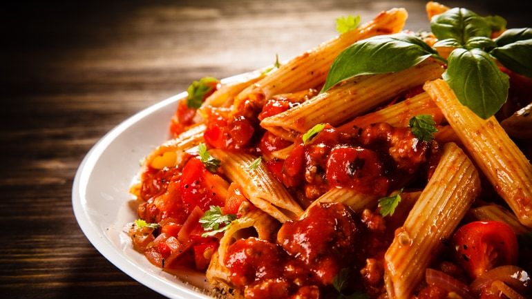 Pasta with meat, tomato sauce and vegetables