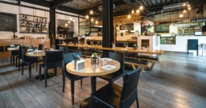 Modern dining space with wood and black accents