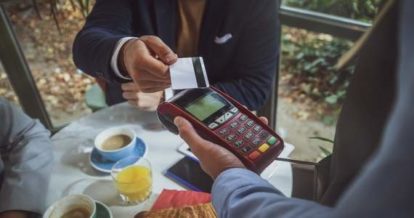 customer paying by tapping with card