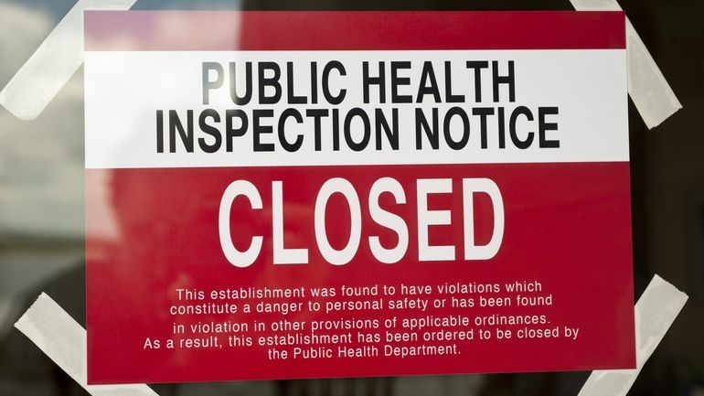 Restaurant closure sign issued by a health department