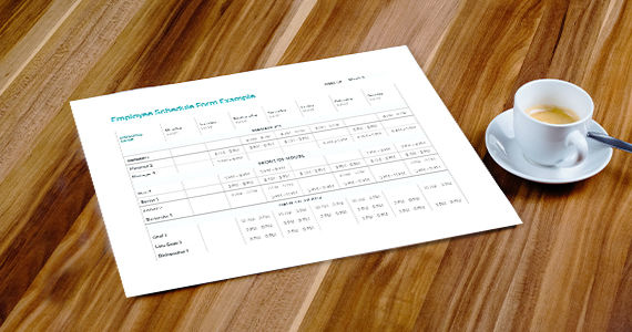 Sheet of paper on the table with the restaurant schedule template on it net to a cup of espresso
