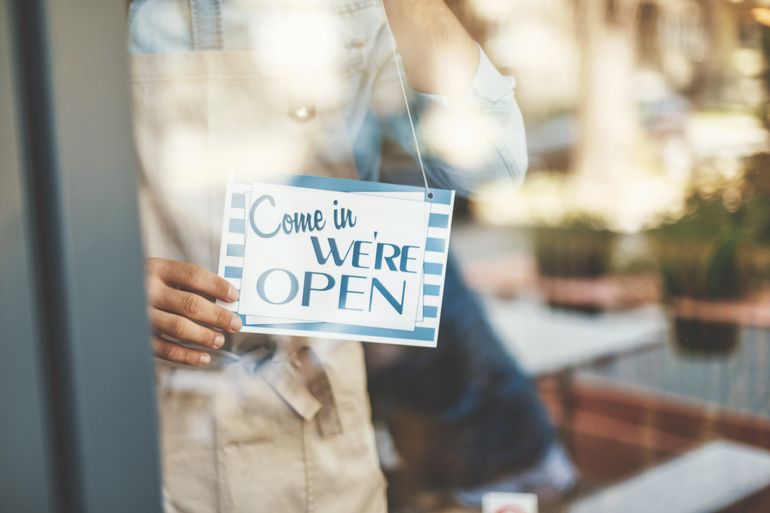 Restaurant opening sign