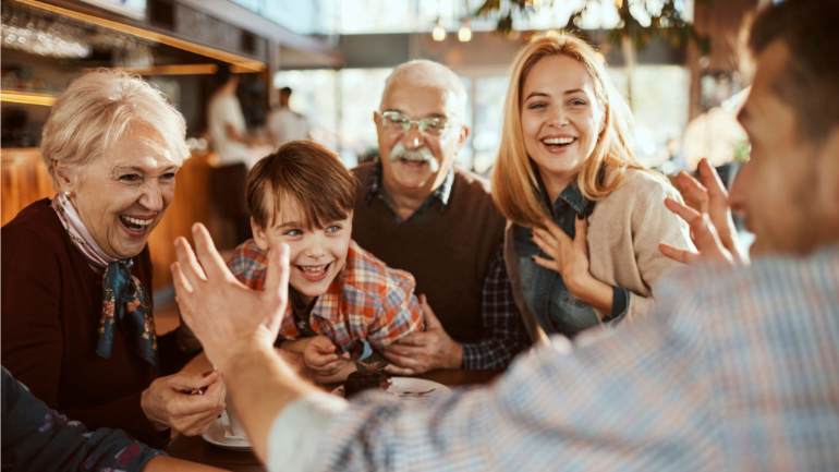 Family celebrating fathers day at a restaurant