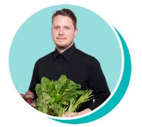 David holding a basket of produce