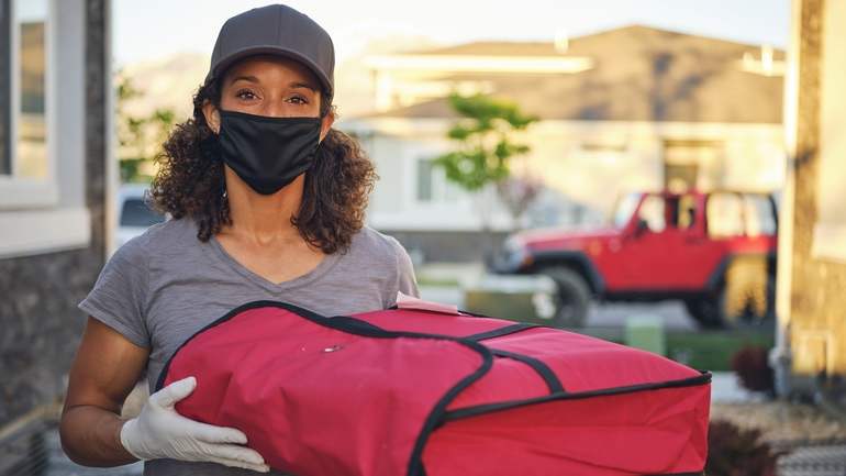 Delivery person wearing mask