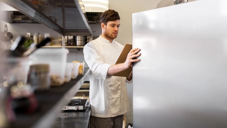 kitchen manager taking inventory