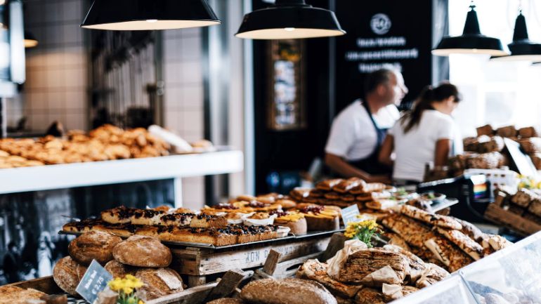 display of pastries at a cafe counter