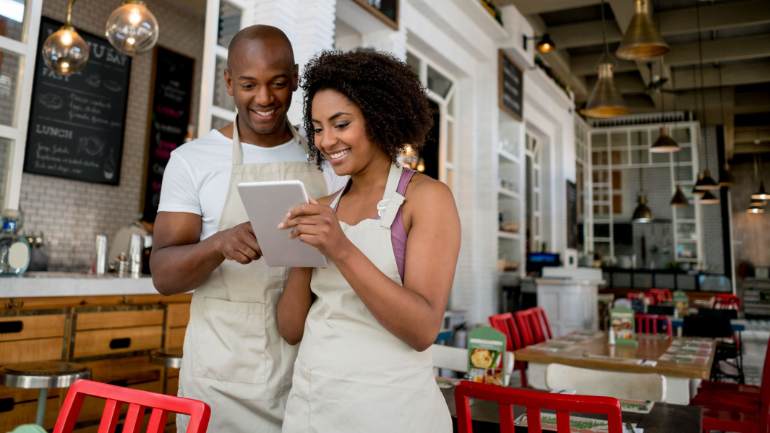 restaurant staff using POS