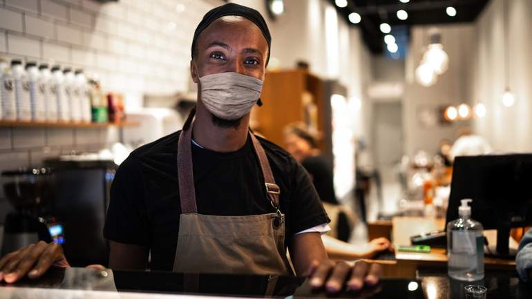 counter staff wearing mask