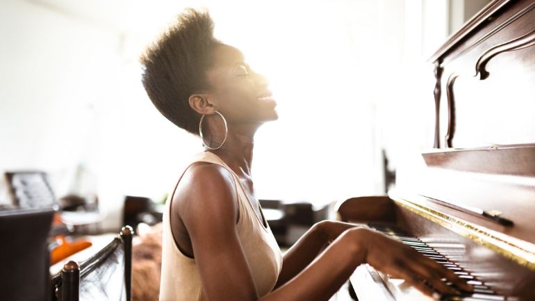 musician playing the piano