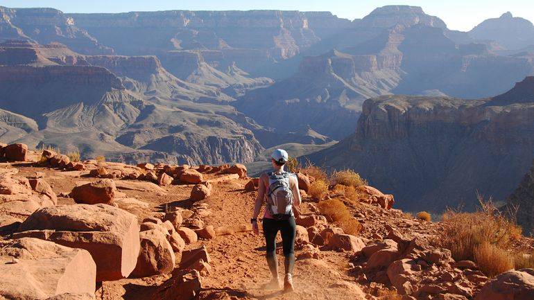 hiker looking over a rocky vista