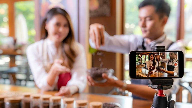camera on tripod capturing a restaurant idea for social media