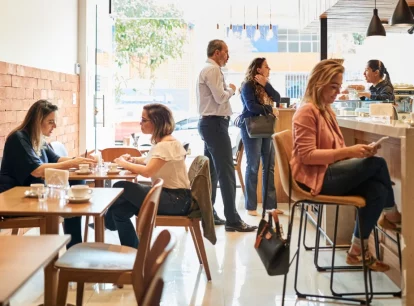 image of an interior of a restaurant with people dining