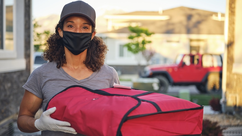 Woman delivering takeout food