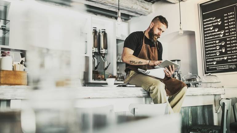 cafe owner using POS