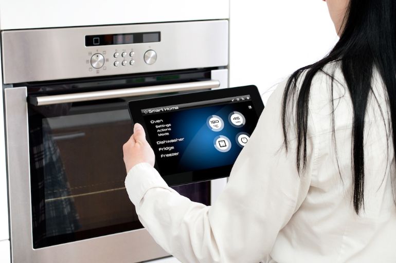 smart oven being controlled by tablet