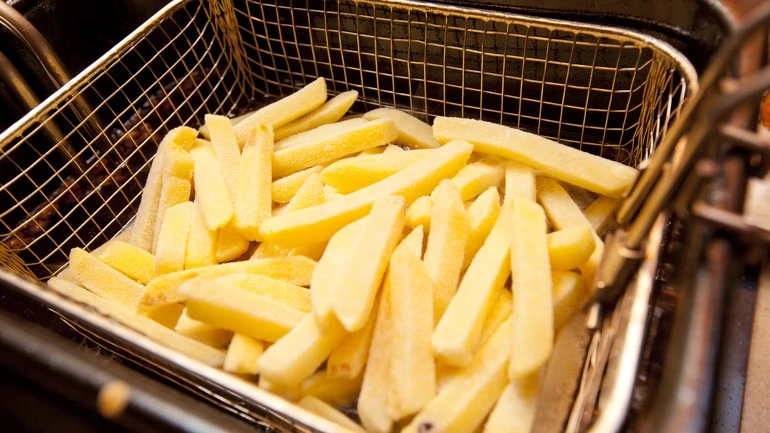 French fries in a deep frier.