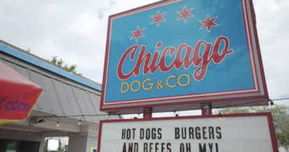 An outdoor sign for the restaurant Chicago Dog & Co.