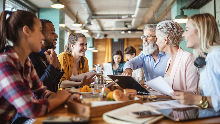 Business people meeting at a restaurant bar.