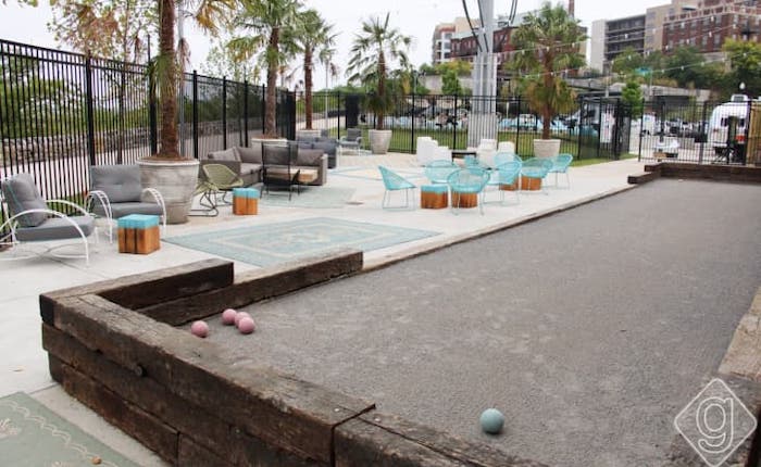 The patio of Nashville’s Pinewood Social, which features outdoor games like lawn bowling.