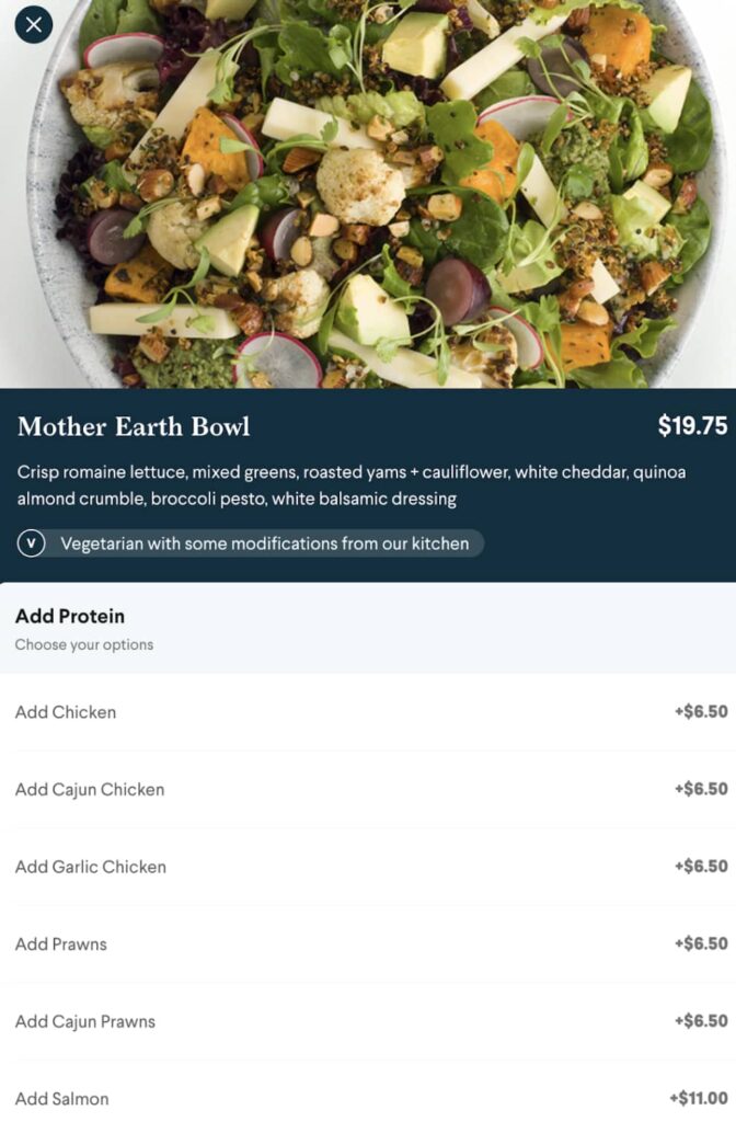 The online ordering page for a salad bowl that shows the prices of each additional topping.