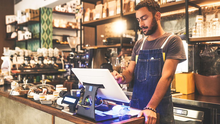 Restaurant staff using a POS system.