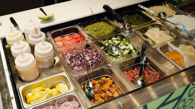 A display of Harvest Clean Eats fresh ingredients.