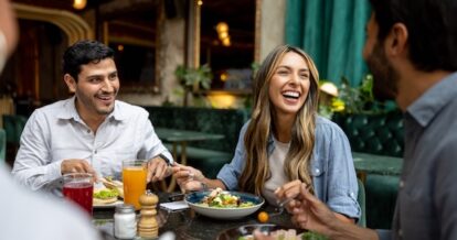 Group of three diners dining at a restaurant.